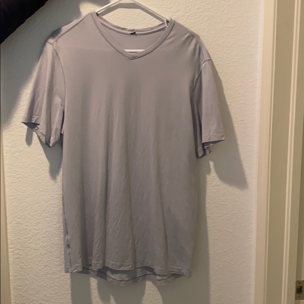 Lululemon “5th year V-neck” men’s tee.